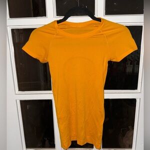 Lululemon Athletica Bright Orange Short Sleeve Top